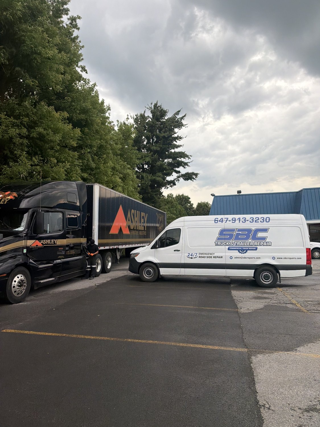 SBC mobile roadside service van assisting a commercial truck